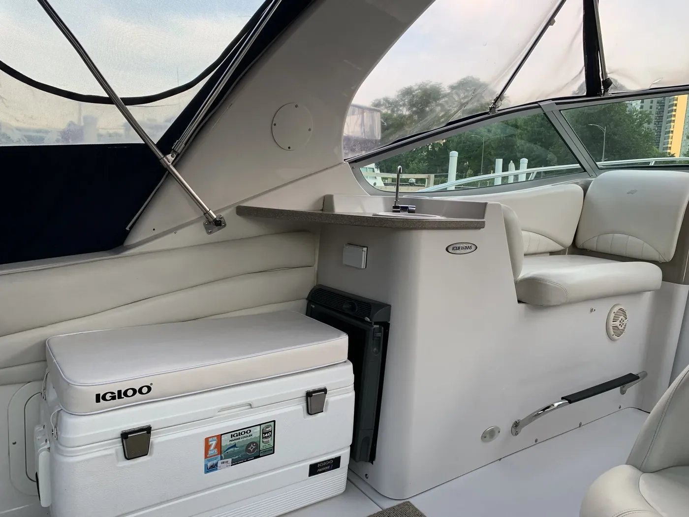 Cockpit seating with cooler, sink and wet bar aboard the yacht